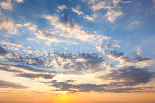 Amazing Sundown Sky with Beautiful Clouds and Sunbeams Stock photo © Taiga