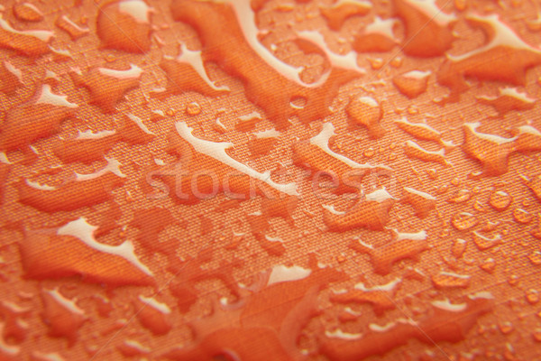 Orange wasserdicht Textil Tropfen Textur abstrakten Stock foto © Taiga