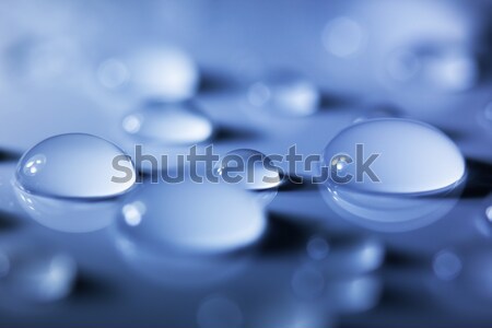 Stock photo: Blue Big Water Drops Background  /  focus on the center