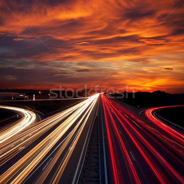 Foto stock: Velocidad · tráfico · puesta · del · sol · tiempo · luz · autopista