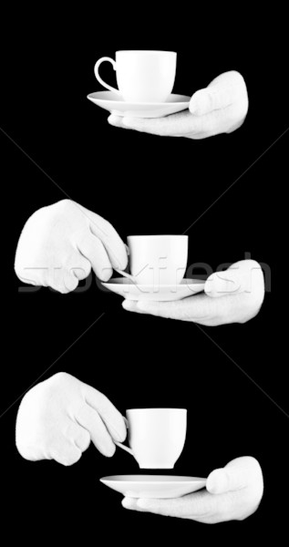 someone wearing white gloves with a cup of coffee Stock photo © Taiga