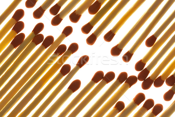 Stock photo: Matches close up on white background /  back lit