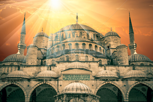 Fantastic view of Blue Mosque with sun and amazing sunbeams Stock photo © Taiga