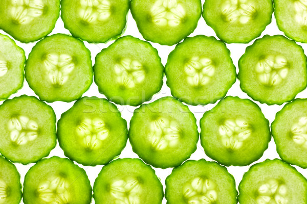 Slices of fresh Cucumber / background / back lit Stock photo © Taiga