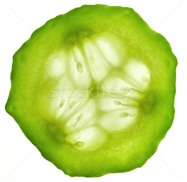 Stock photo: Cucumber slice / isolated on white /  back lit