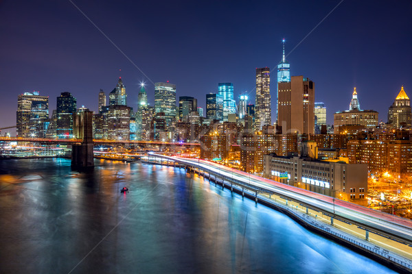  New York City night scene with Manhattan skyline and Brooklin B Stock photo © Taiga