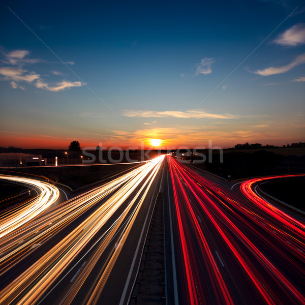 Geschwindigkeit Verkehr Langzeitbelichtung Autobahn Autobahn Sonnenuntergang Stock foto © Taiga