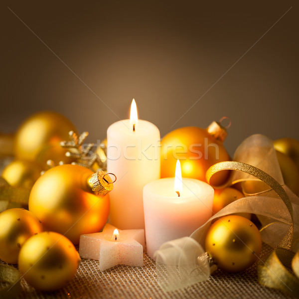 Christmas Golden Candles Decoration With Glitter And Baubles Stock