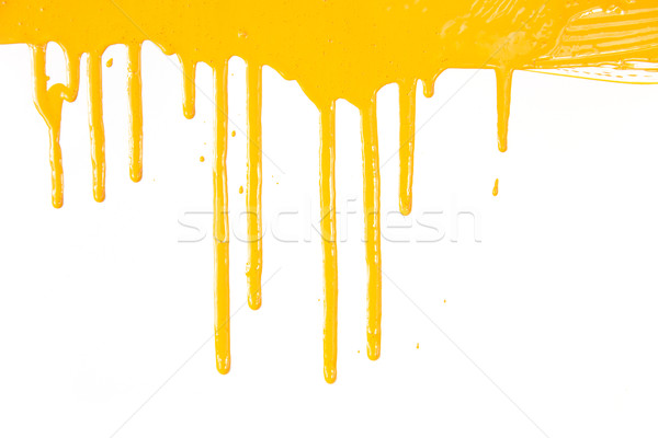 Orange paint  dripping / isolated on white / real photo Stock photo © Taiga