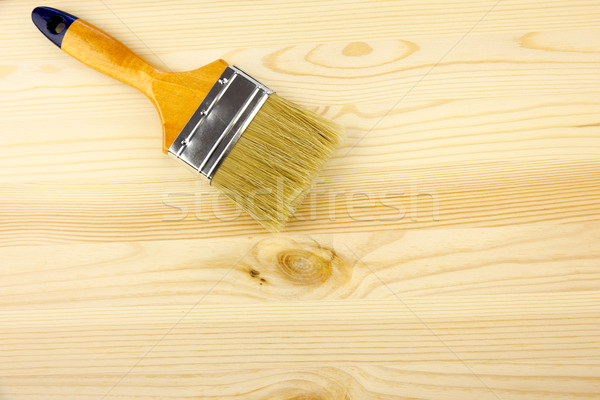 Wood and paintbrush / covering by varnish Stock photo © Taiga