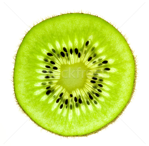 Slice of a fresh Kiwi / Super Macro /  back lit Stock photo © Taiga