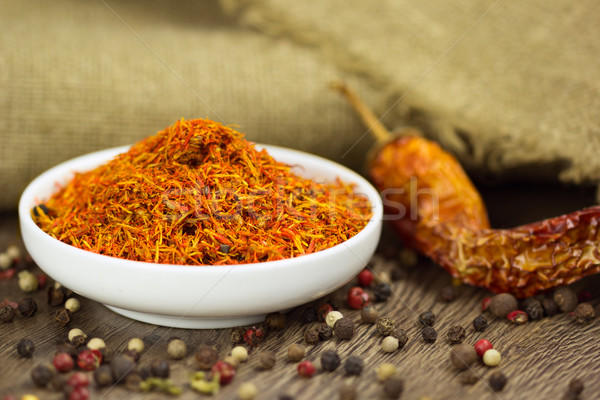 Stock photo: Saffron in saucer with pepper and chili