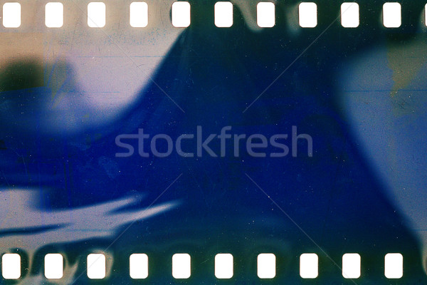 Vieux grunge bande de film bruyants bleu bande de film Photo stock © Taigi