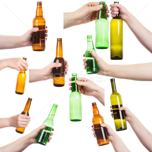 Collection of female hands holding bottles of alcohol Stock photo © Taigi