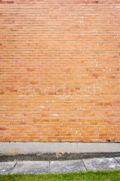 Rojo pared de ladrillo hierba verde casa textura edificio Foto stock © Taigi