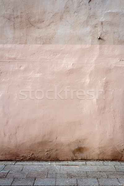 Kopott utca fal viharvert rózsaszín textúra Stock fotó © Taigi