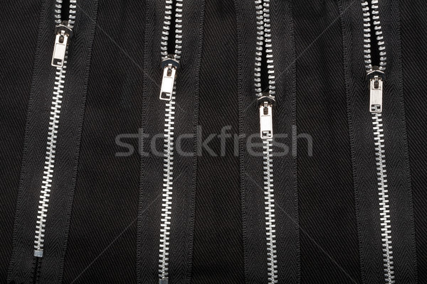 Zippers on fabric Stock photo © Taigi