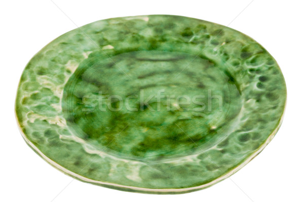 Green handmade pottery plate Stock photo © Taigi