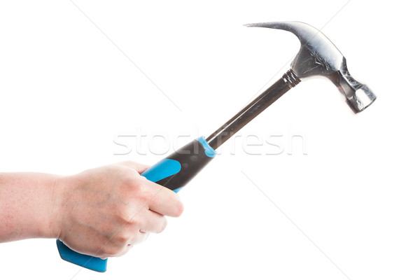 Female hand holding a hammer  Stock photo © Taigi