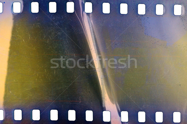 Vechi grunge filmstrip galben violet vibrant Imagine de stoc © Taigi