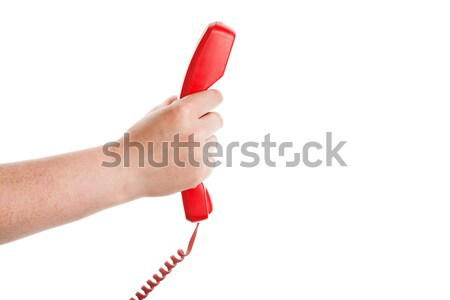 Red telephone receiver in hand  Stock photo © Taigi