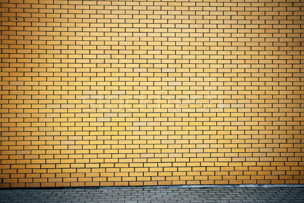 Foto stock: Vibrante · amarillo · pared · de · ladrillo · moderna · imagen · edificio