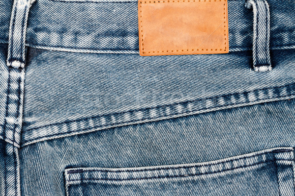 Label sewed on a blue jeans    Stock photo © Taigi