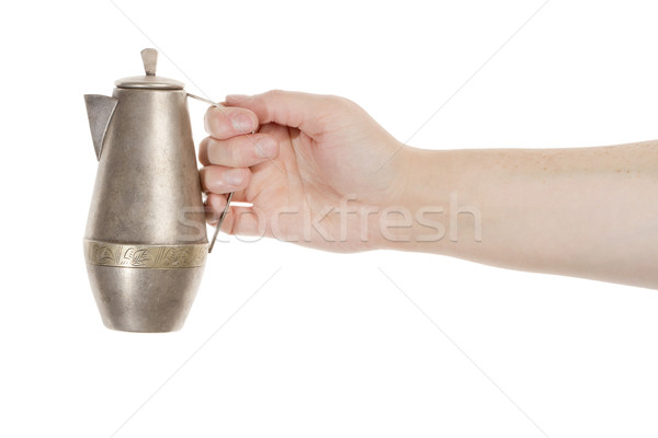 Hand holding silver jug Stock photo © Taigi