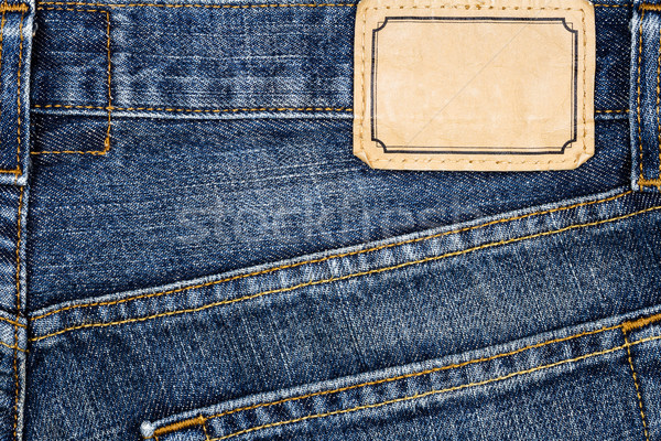 Label sewed on a blue jeans    Stock photo © Taigi