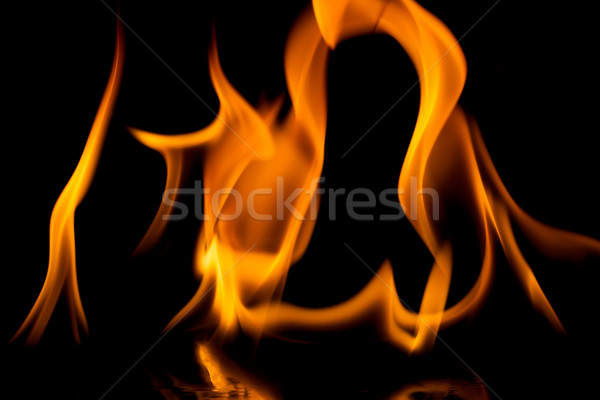Tűz lángok izolált fekete absztrakt háttér Stock fotó © Taigi