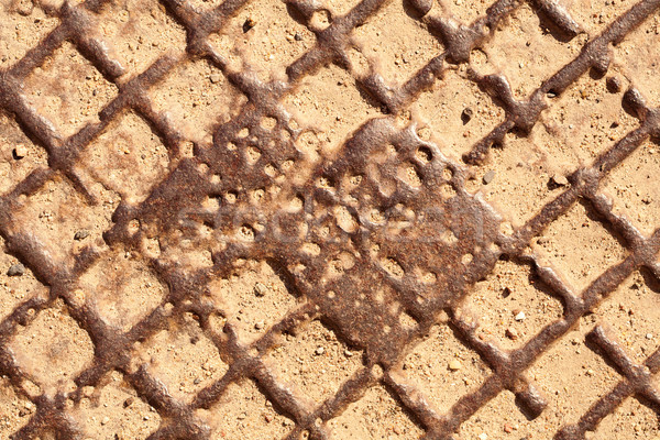 Kanał ściekowy okładka tekstury budynku tle piasku Zdjęcia stock © Taigi