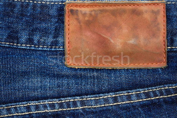 Label sewed on a blue jeans  Stock photo © Taigi
