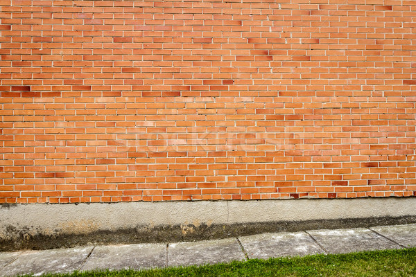 Rojo pared de ladrillo hierba verde casa textura edificio Foto stock © Taigi