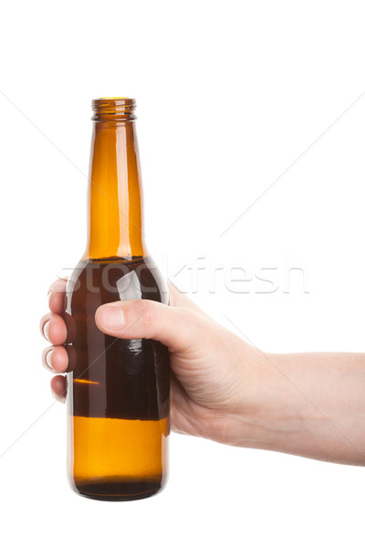 Sörösüveg kéz izolált fehér sör fény Stock fotó © Taigi