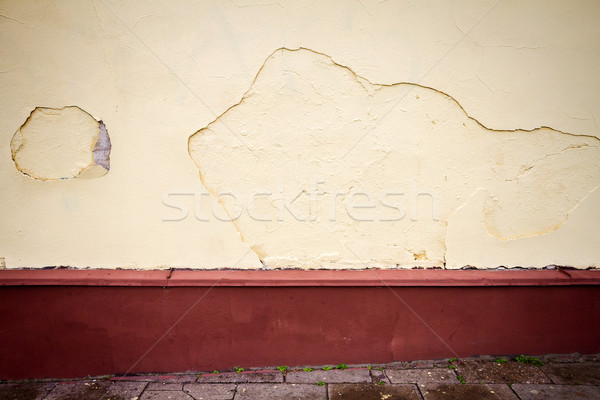Old cracked wall  fresh painted in yellow and red Stock photo © Taigi