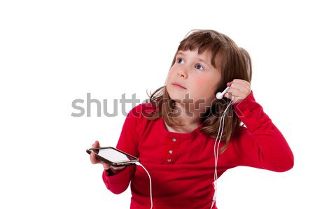 Dziewczyna słuchanie muzyki cute dziewczynka mp3 player Zdjęcia stock © Talanis