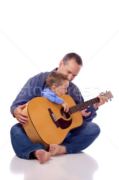ストックフォト: 父から息子 · ギター · 笑顔 · 男性 · 楽しい