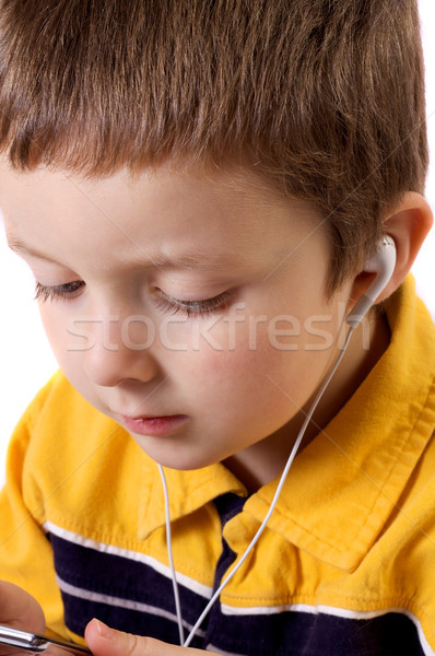 Chłopca słuchanie muzyki cute mały mp3 player młodzieży Zdjęcia stock © Talanis
