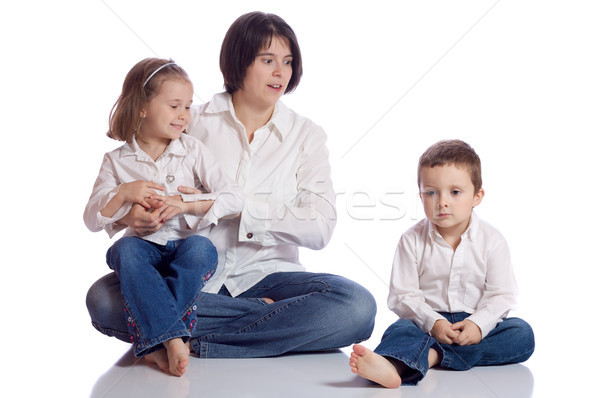 Bonitinho família mãe olhando surpreendido crianças Foto stock © Talanis