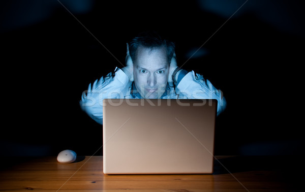 Computador cara homem orelhas trabalhar tecnologia Foto stock © Talanis