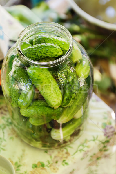 Preserved cucumbers -  national Russian tablecloth made of linen Stock photo © TanaCh