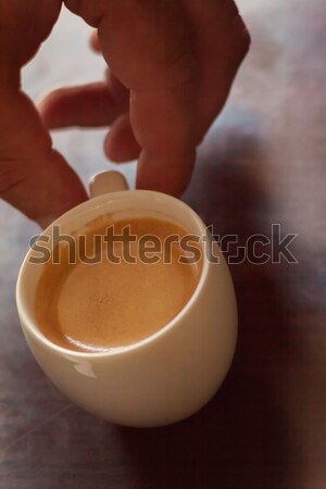 Close up profile of a man hands relaxing holding a cup of coffee Stock photo © TanaCh