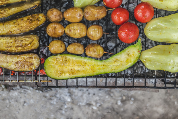 Assorted grilled vegetables.Chef cooking vegetables.top view clo Stock photo © TanaCh