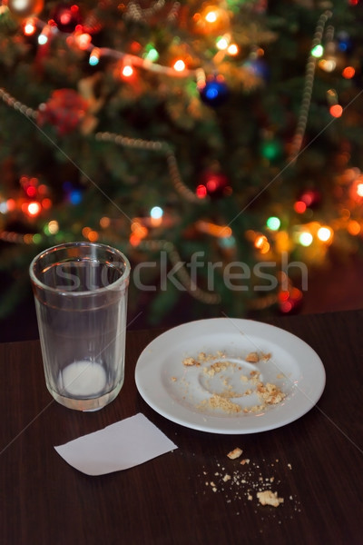 Pusty szkła mleka bułka tarta cookie Święty mikołaj Zdjęcia stock © TanaCh
