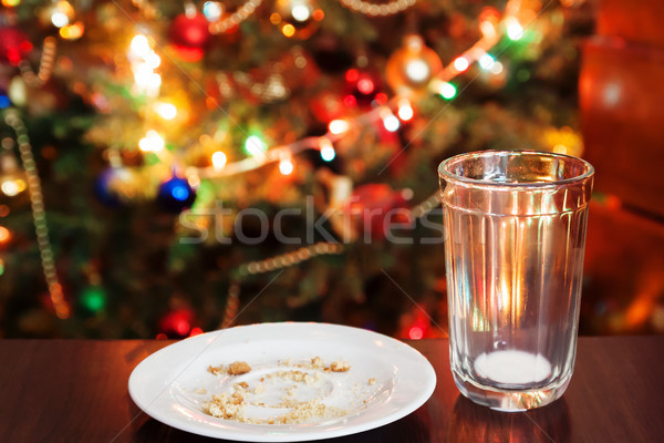 Pusty szkła mleka bułka tarta cookie Święty mikołaj Zdjęcia stock © TanaCh