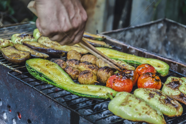 Assorted grilled vegetables.Chef cooking vegetables.top view clo Stock photo © TanaCh