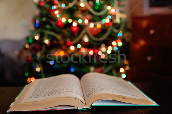 Christmas and bible with blurred candles light background Stock photo © TanaCh