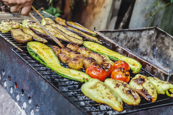 Assorted grilled vegetables.Chef cooking vegetables.top view clo Stock photo © TanaCh
