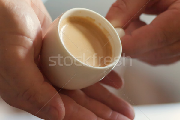 Close up profile of a man hands relaxing holding a cup of coffee Stock photo © TanaCh