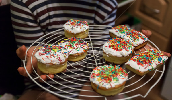 Little Easter cakes in children's hands, life style Stock photo © TanaCh